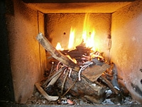 Kerzen-Methode zum richtigen anzünden, anheizen von Holz in Kaminöfen